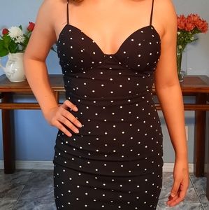 Black polka-dot dress